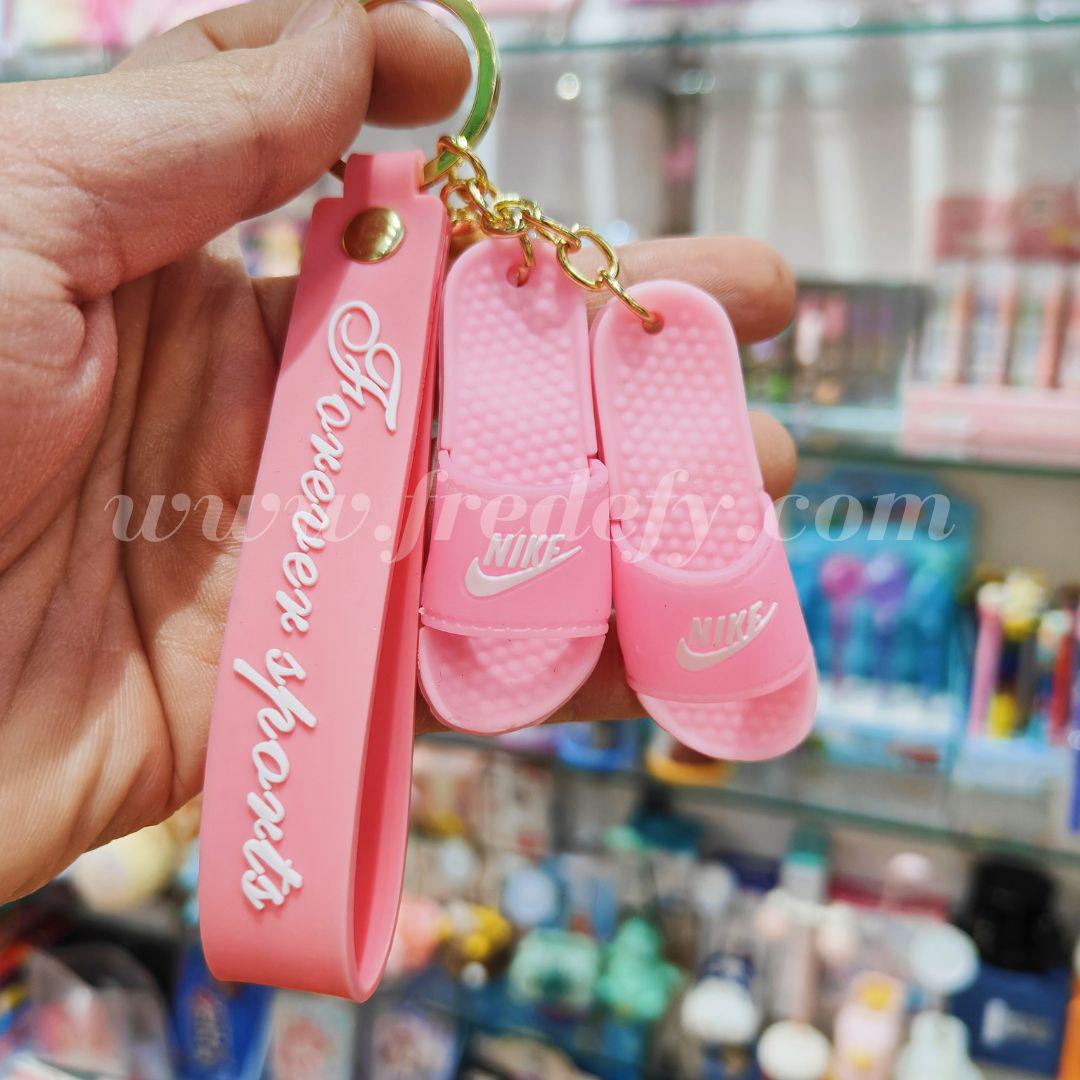 Nike shop slide keychain